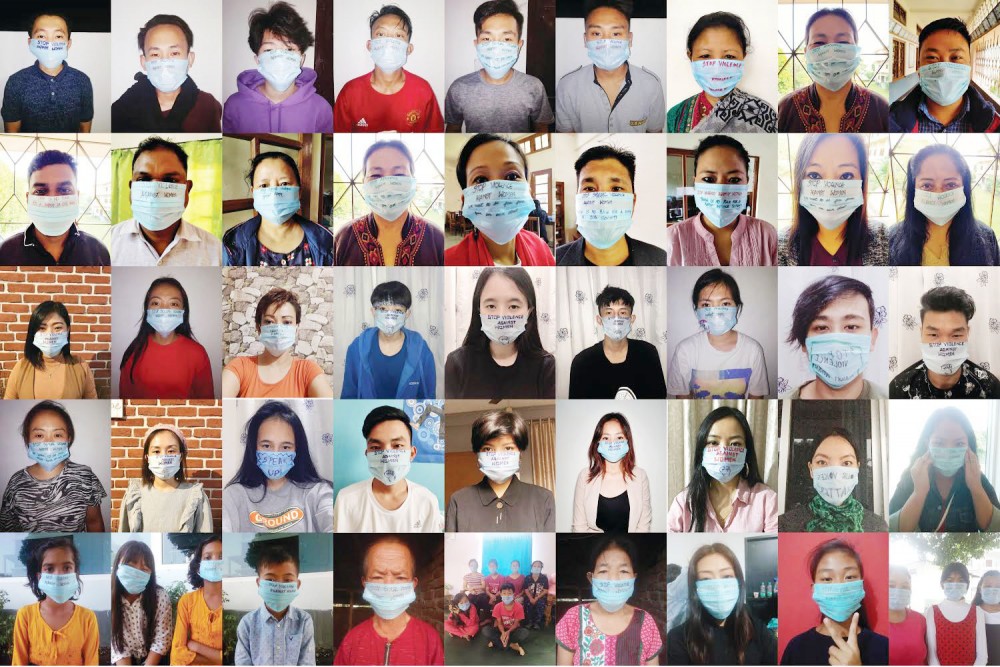 Participants of the SN's social media campaign wearing face masks with slogans against domestic violence.